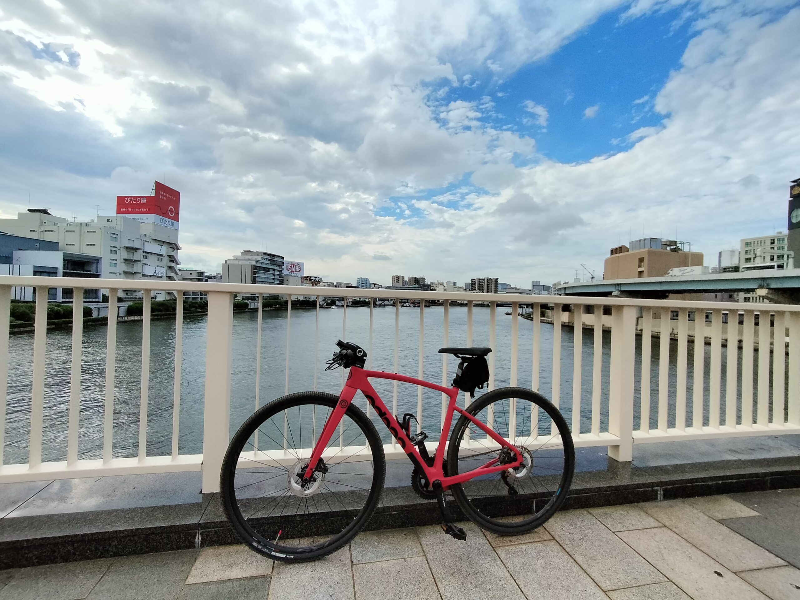 Cycling in Tokyo by the river